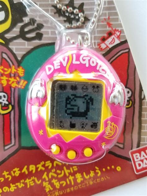 devil tamagotchi|tamagotchi deviltchi pink.